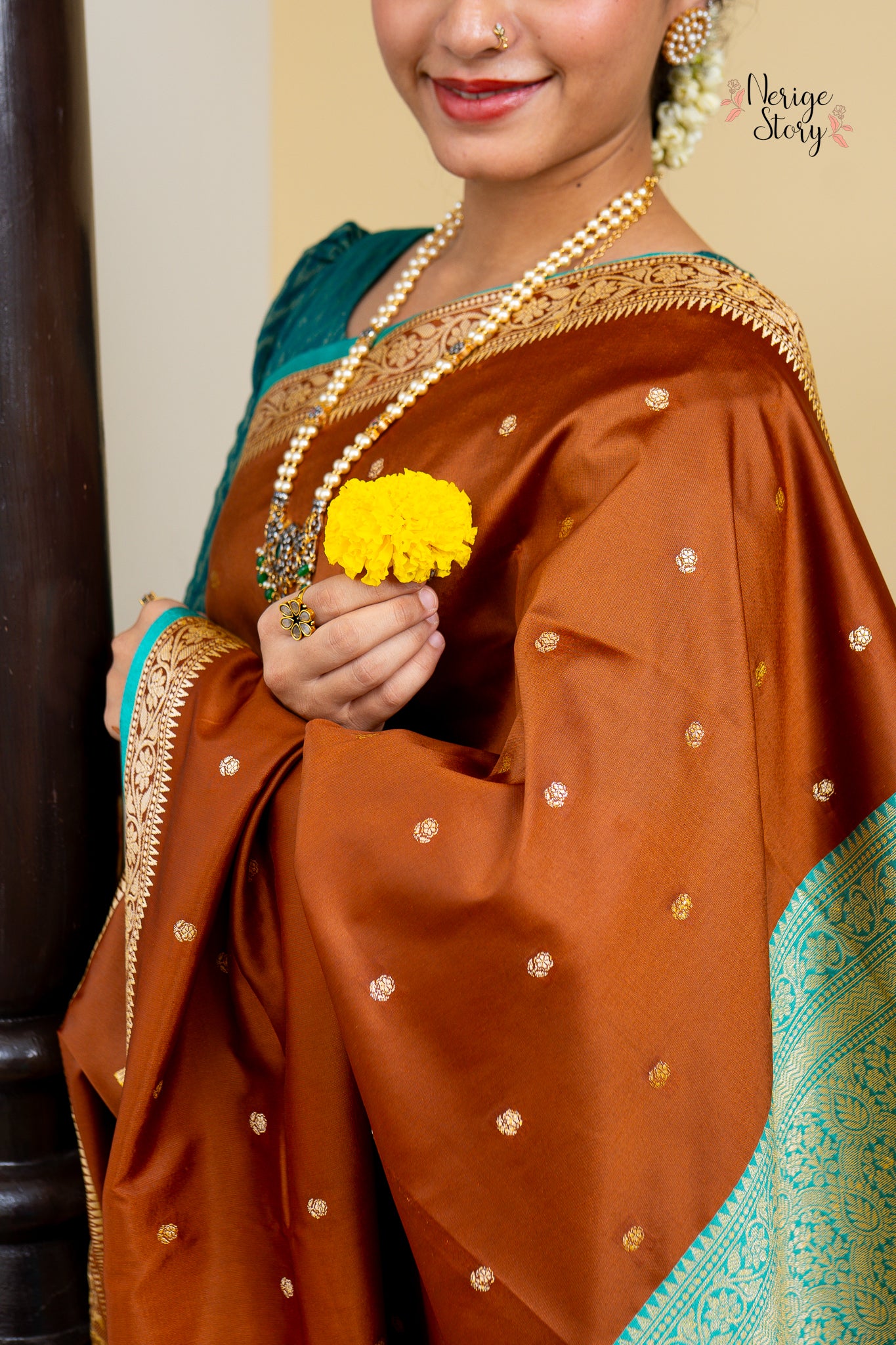 GUNADHYA (गुणाध्या)