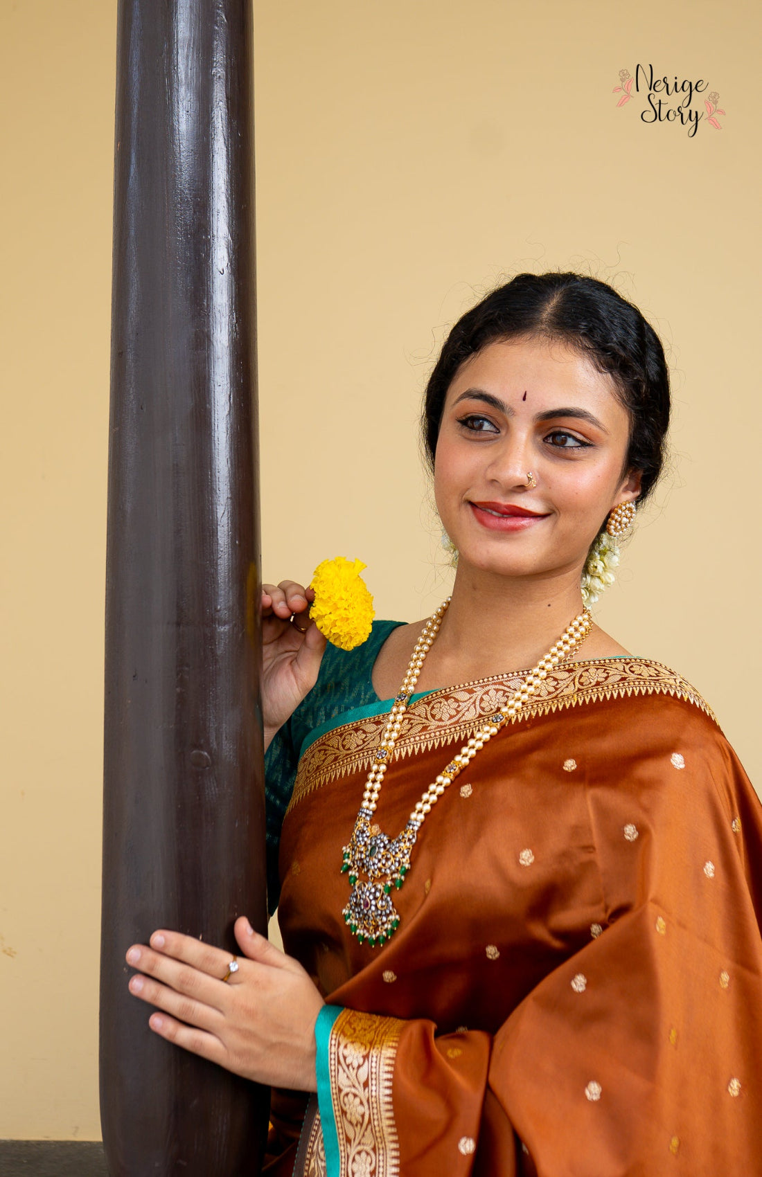 GUNADHYA (गुणाध्या)
