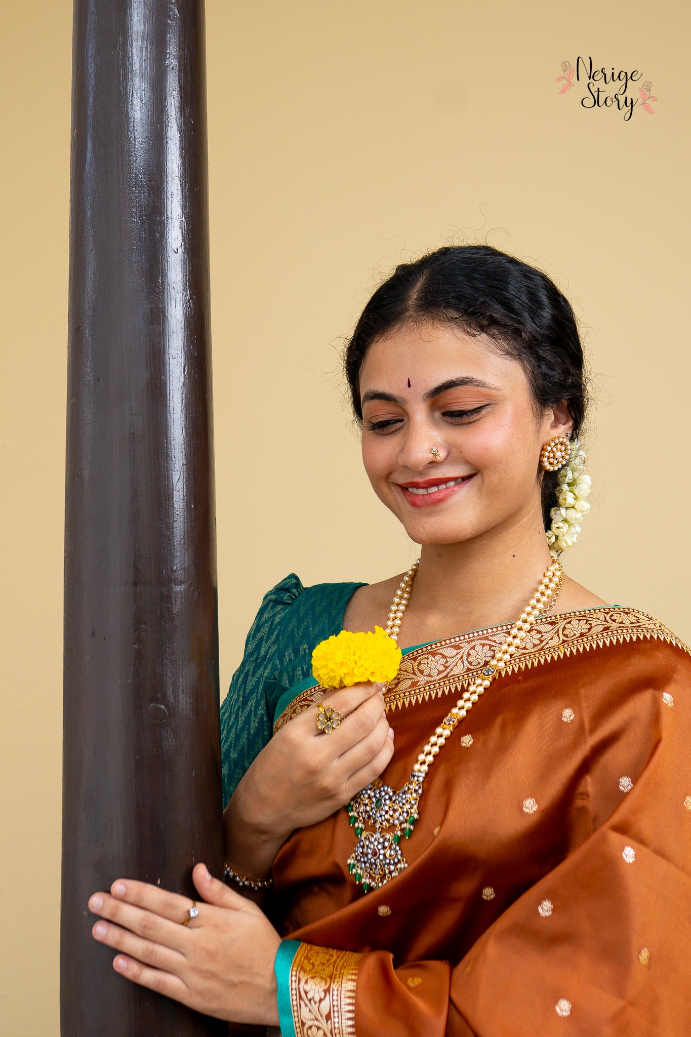 GUNADHYA (गुणाध्या)